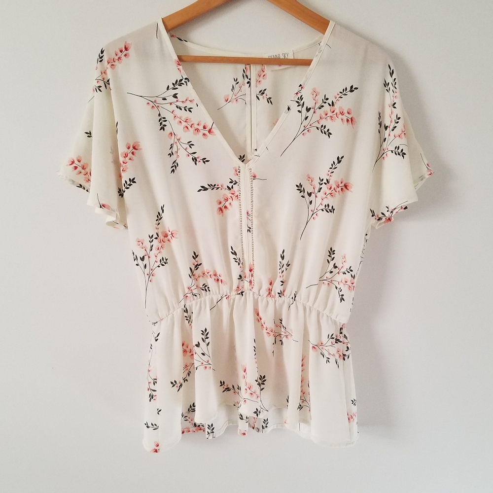 Floral flutter sleeve peplum blouse